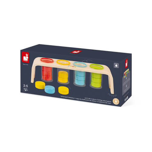 Dark blue box showing a wooden sorting toy with red, yellow, blue, and green rings and matching stacked discs.