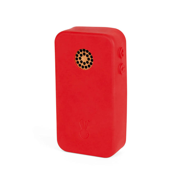 Bright red rectangular wooden toy phone with rounded corners, a circular speaker grille, and two side buttons.