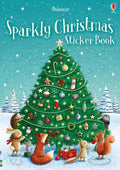 Woodland animals decorate a large Christmas tree on a teal blue, snowy book cover with sparkling white stars.