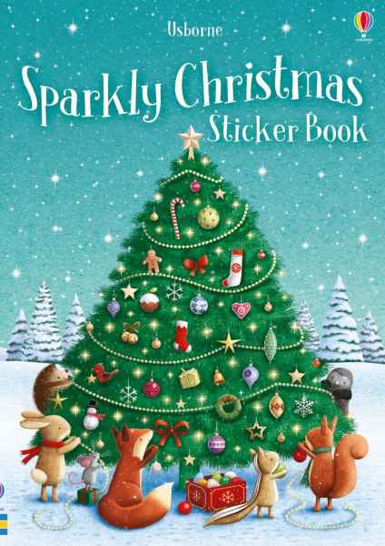 Woodland animals decorate a large Christmas tree on a teal blue, snowy book cover with sparkling white stars.
