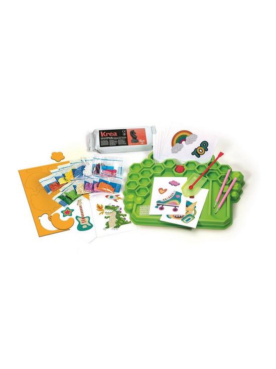Gemstone craft kit with green hexagonal tray, colorful bead packs, design templates, and two pink stylus pens.