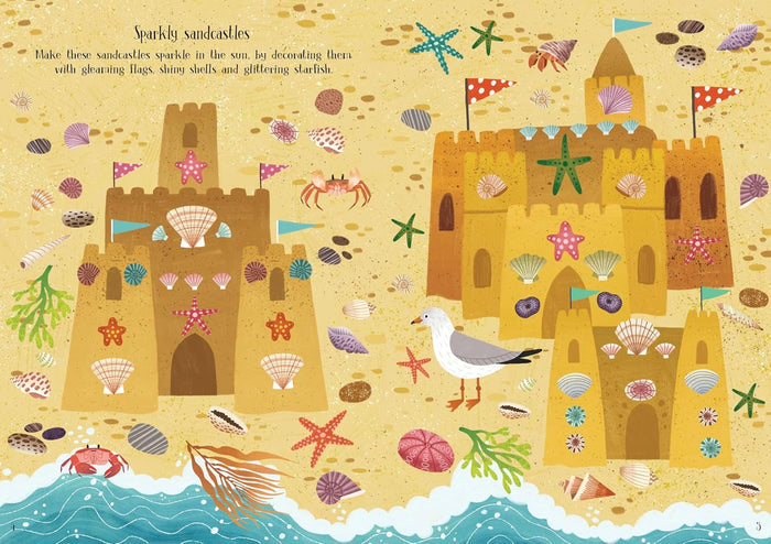 Illustrated beach scene with two sandcastles decorated with colorful seashells, starfish, and flags near ocean waves.