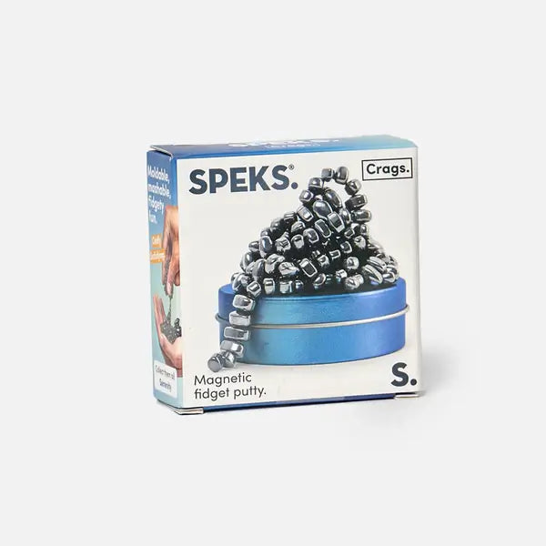 Speks Crags packaging featuring a pile of irregular, metallic grey magnets on a round blue tin.