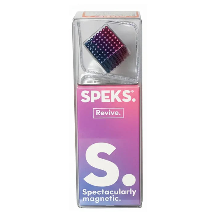 A cube of tiny blue and pink magnetic balls inside clear packaging with a pink and purple SPEKS logo box.