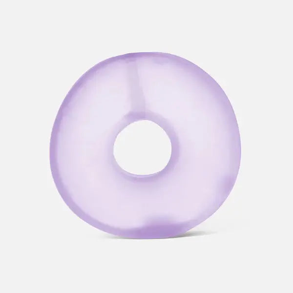 Translucent purple donut-shaped gel loop with a smooth, squishy texture against a light gray background.