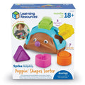 Box for a brown hedgehog toy with blue shell and 5 colorful fidget popper shapes: heart, star, triangle, square, circle.