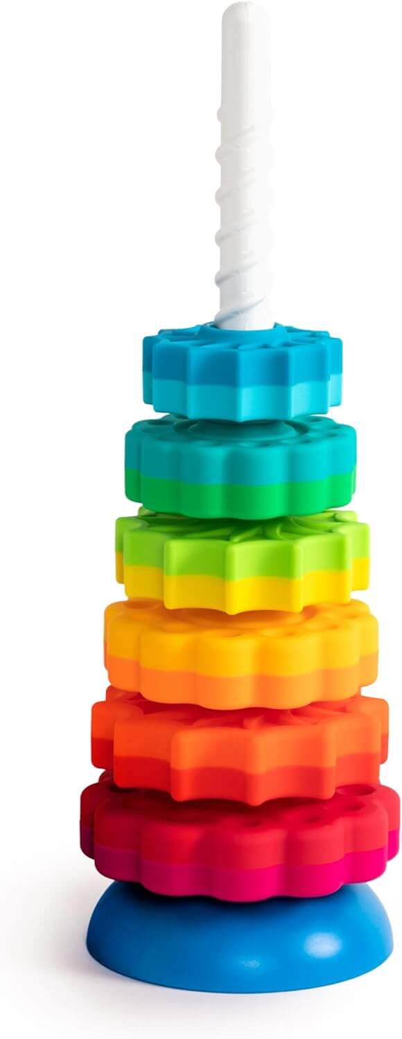 Six colorful dual-toned star-shaped gears stacked by size on a white spiral pole with a blue base.