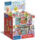 Display box of colorful Baby Clementoni unicorn and dragon figurines with large eyes and rounded spinning bases.