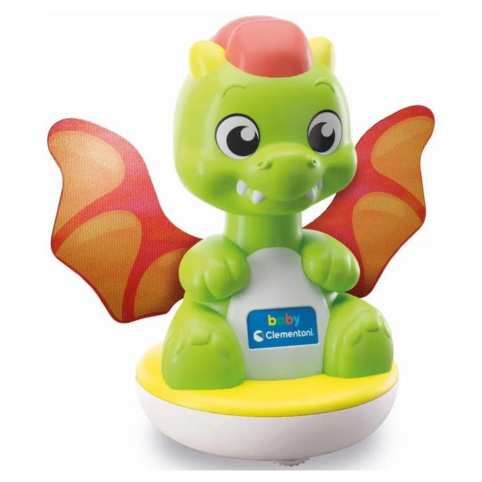 Green toy dragon with red and orange patterned wings on a rounded yellow and white spinning base.