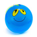 Blue inflatable ball featuring a smiley face with large yellow eyes and a lime green coiled spiral tether.