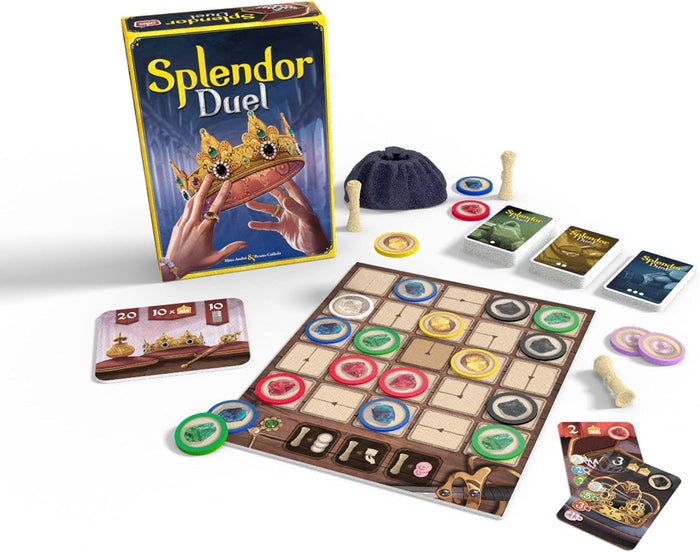 Board game box with a gold crown, a grid board with colorful gem tokens, decks of cards, and a blue cloth bag.