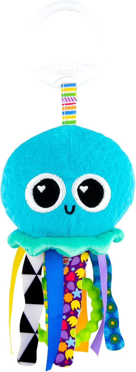 Blue plush jellyfish toy with large heart eyes, green frill, and various colorful patterned ribbon tentacles.