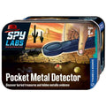Rectangular metal tin with desert graphics showing a hand scanning the ground for a buried gold ring and coin.