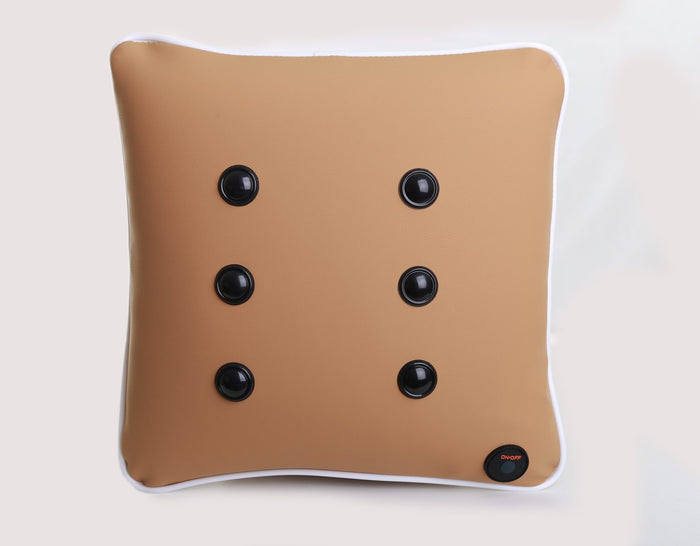 Tan square cushion with white trim, six black massage nodes, and a power button in the bottom right corner.