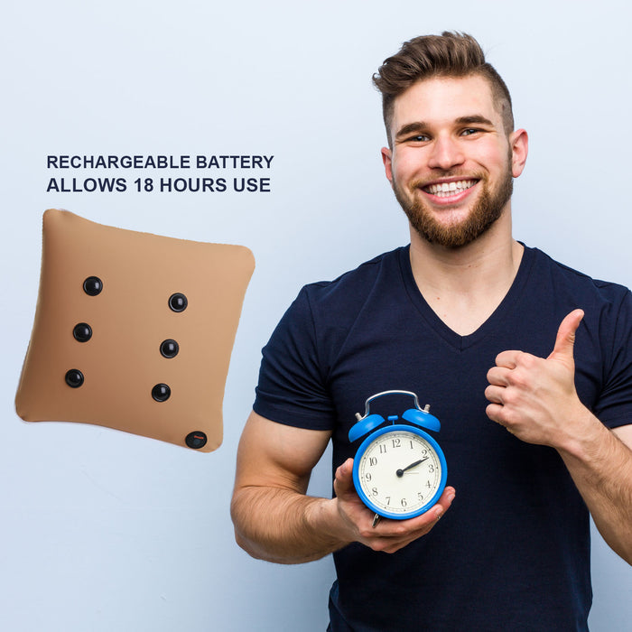 Tan square pillow with six black massage nodes. A man gives a thumbs up while holding a blue alarm clock.