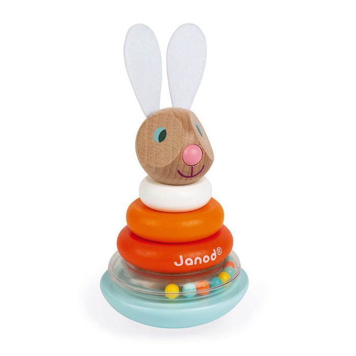 Wooden stacking rabbit with felt ears, white and orange rings, and a clear rattle base on a light blue stand.