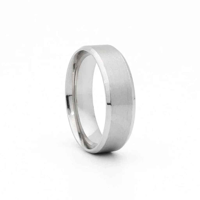 Stainless steel 8mm wide beveled edge band ring by Glitters, showcasing a sleek, polished design on a plain background.