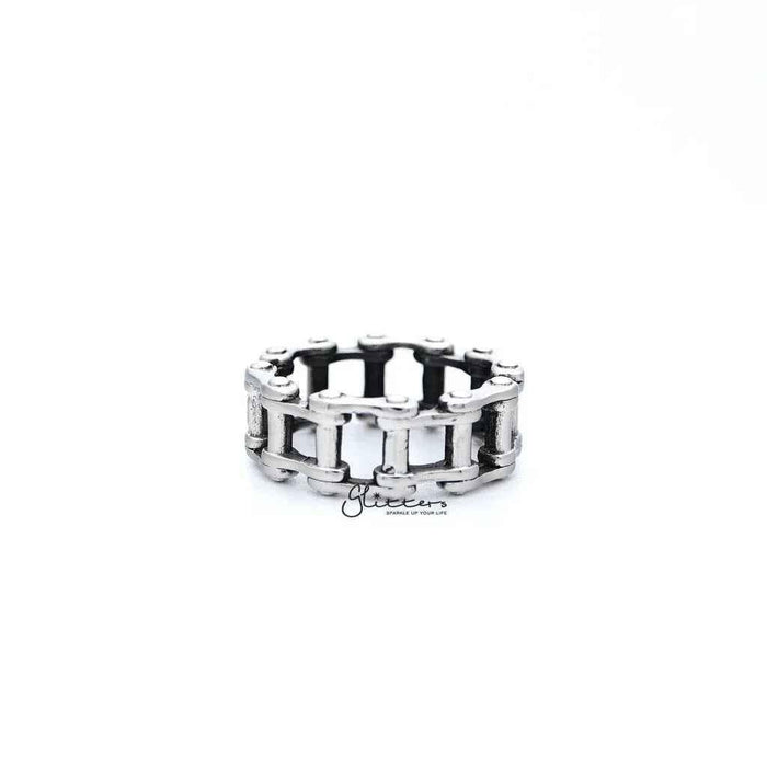 Stainless steel men's ring with antiqued motorcycle chain casting design by Glitters, showcasing rugged and detailed craftsmanship.
