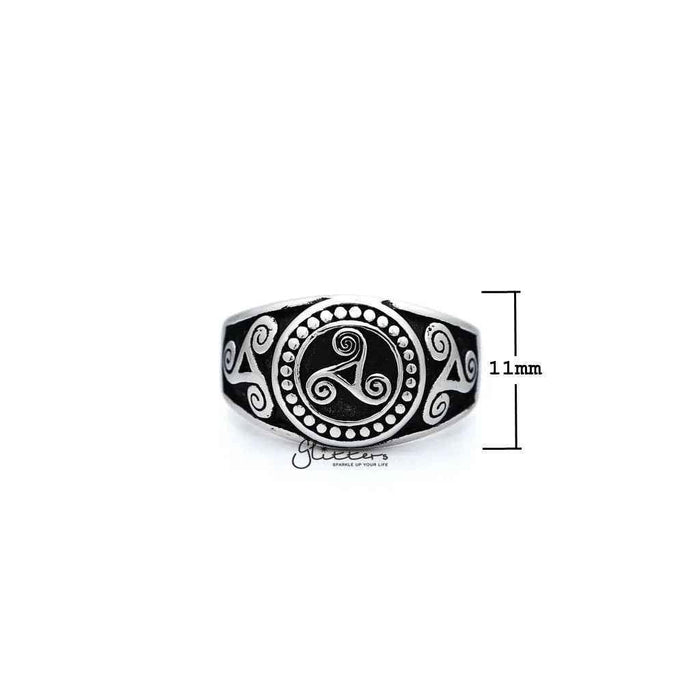 Stainless steel men's ring with antiqued triskele and triple spiral design, cast by Glitters, showcasing intricate metalwork and craftsmanship.