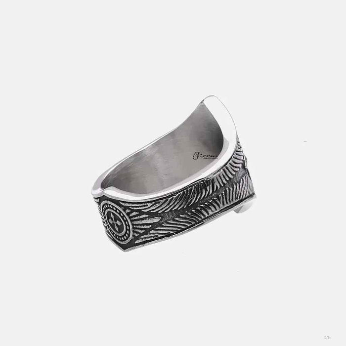 Stainless steel compass ring by Glitters featuring a detailed compass design on a sleek band.