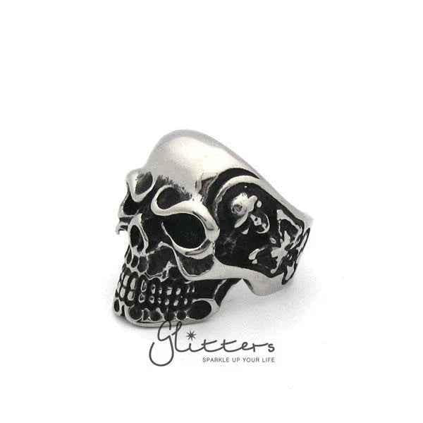Stainless steel Gothic skull cast men's ring from Glitters featuring a detailed skull design on a sleek band.