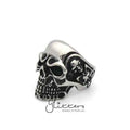 Stainless steel Gothic skull cast men's ring from Glitters featuring a detailed skull design on a sleek band.