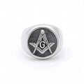 Stainless Steel Masonic Ring by Glitters featuring intricate engraved symbols on a polished silver-tone band.