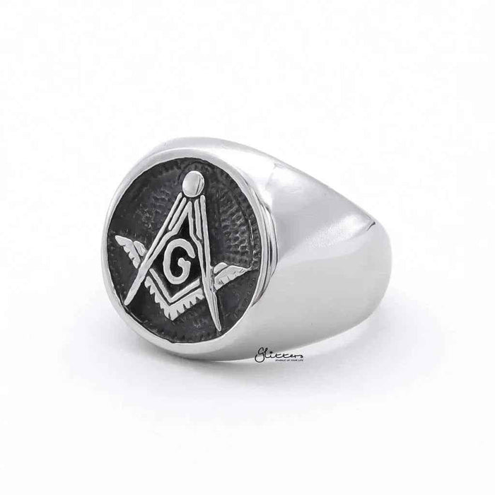 Stainless steel Masonic ring by Glitters featuring engraved symbols and a polished finish, designed for men and women.