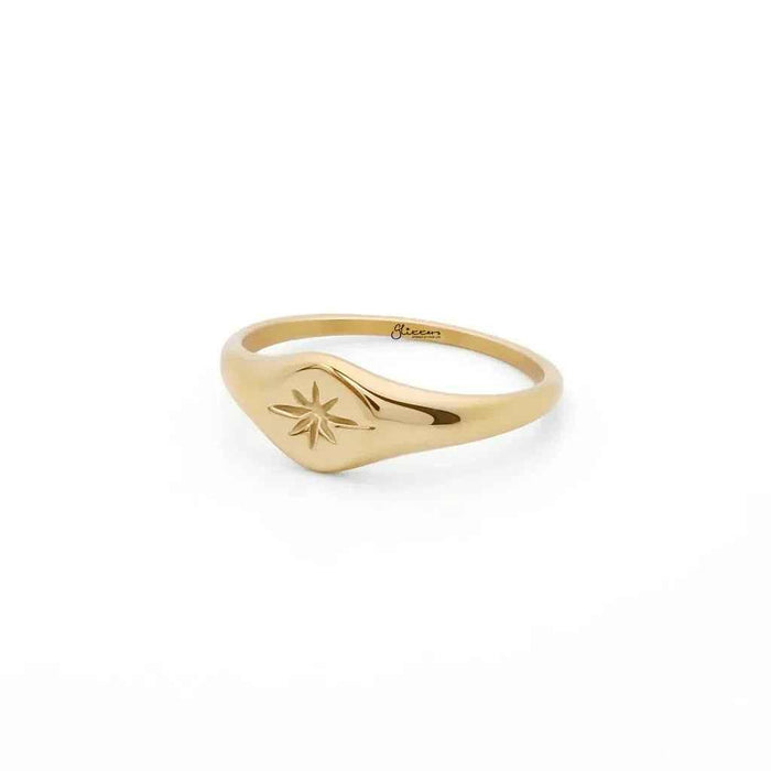 Gold stainless steel oval sunburst signet ring by Glitters, featuring a polished, intricate sunburst design on a sleek band.