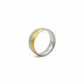 Stainless steel two-tone band ring with gold and silver stripes, stylish jewelry by Glitters, showcasing a sleek, modern design.