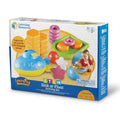Box featuring a blue and yellow submarine, orange hexagonal blocks, pink rings, and colorful stars for water play.