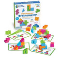 Geometric blocks with bright stripes and patterns shown with activity cards and the Brainometry box.
