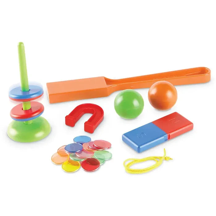 Colorful magnetic toy set with orange wand, horseshoe and bar magnets, stacked rings, balls, and translucent chips.