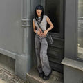 Women’s grey street retro low-rise denim cargo pants by Mead's Supply & Equipment Outfitters, featuring classic cargo pockets and relaxed fit.