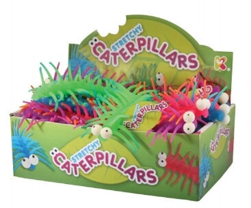 Neon green, pink, and blue spiky rubber caterpillars with googly eyes in a green display box with leaf designs.