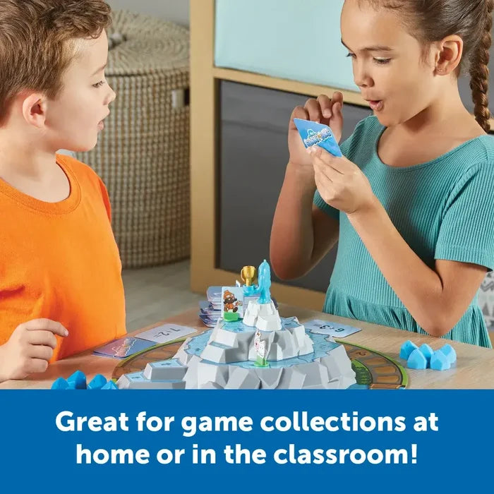 Children playing Summit Sums math game with a 3D mountain game board and addition and subtraction cards.