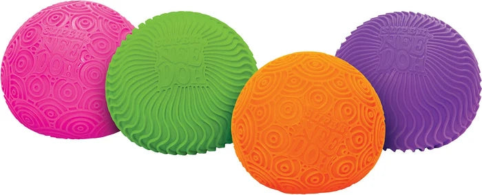 Four squishy balls in pink, green, orange, and purple, featuring embossed swirl and circular ripple patterns.