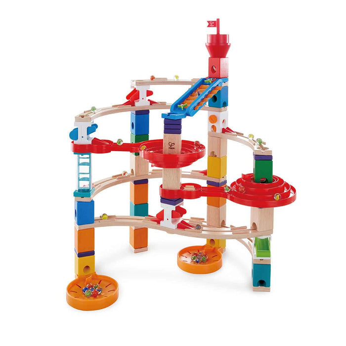 Colorful wooden marble run with multi-level spiral tracks, red funnels, and glass marbles collected in basins.