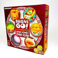 Red board game box featuring cute, colorful dim sum characters in dishes around a central circular spinner design.