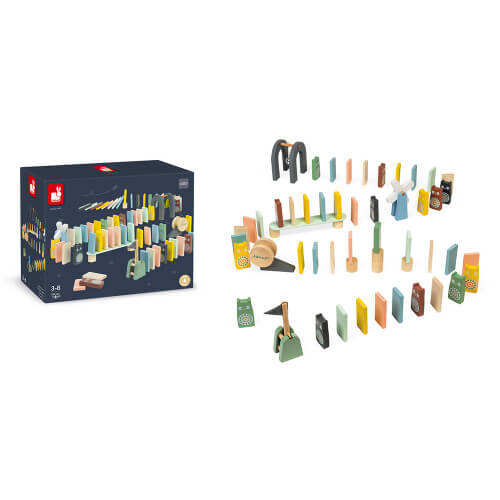 Pastel wooden dominoes and accessories arranged in a winding path next to their dark blue product box.
