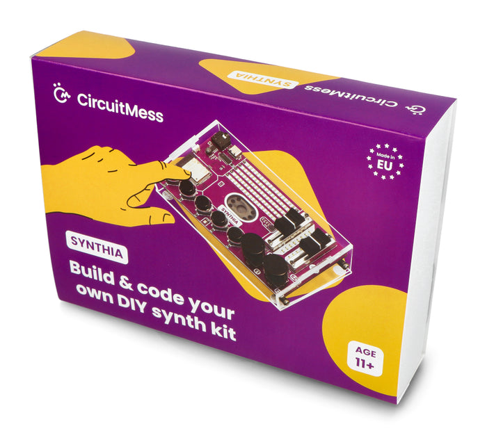 Purple and yellow box for a DIY synth kit featuring a clear electronic device with black knobs and sliders.