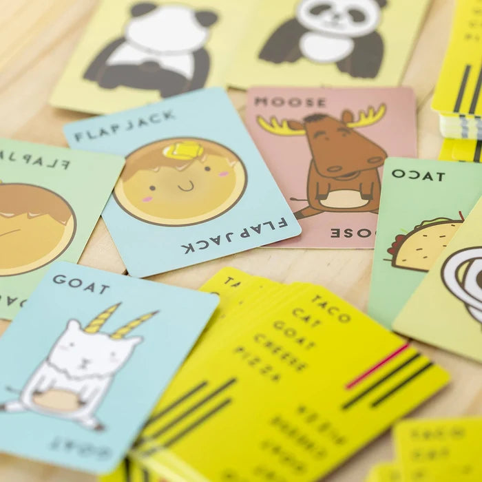 Colorful game cards featuring cute cartoon illustrations of a moose, goat, and pancake on pastel-colored backgrounds.