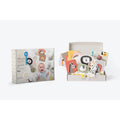 White gift box with animal flashcards, a plush lion, and sensory newborn toys in neutral and high-contrast colors.