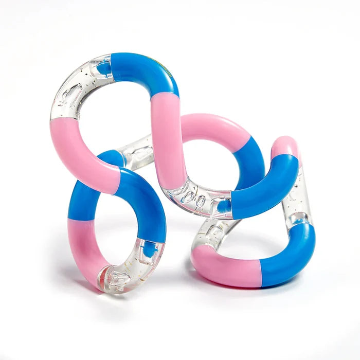 Twisted fidget toy made of interlocking pink, blue, and clear curved segments with small bubbles inside.