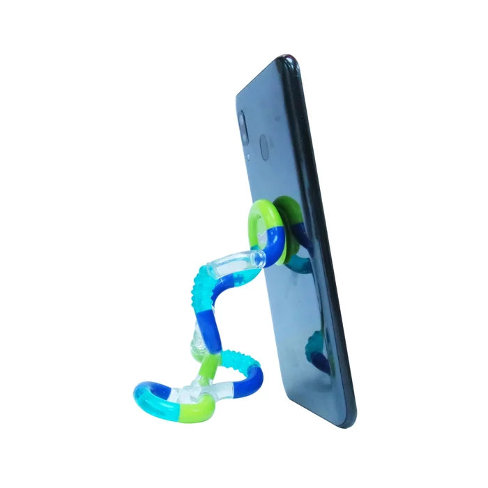 Blue, green, and clear interlocking plastic loops twisted to form a stand for a black smartphone.