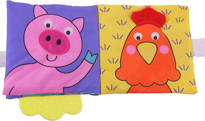 Open soft book with a pink pig and orange chicken on colorful pages and a yellow scalloped teether at the bottom.