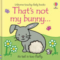 Book cover with a grey bunny, white textured tail, and pink text on a yellow and green background with flowers.