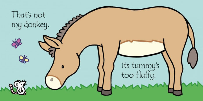 Illustration of a tan donkey with a white belly patch grazing on green grass with a small mouse and butterflies.