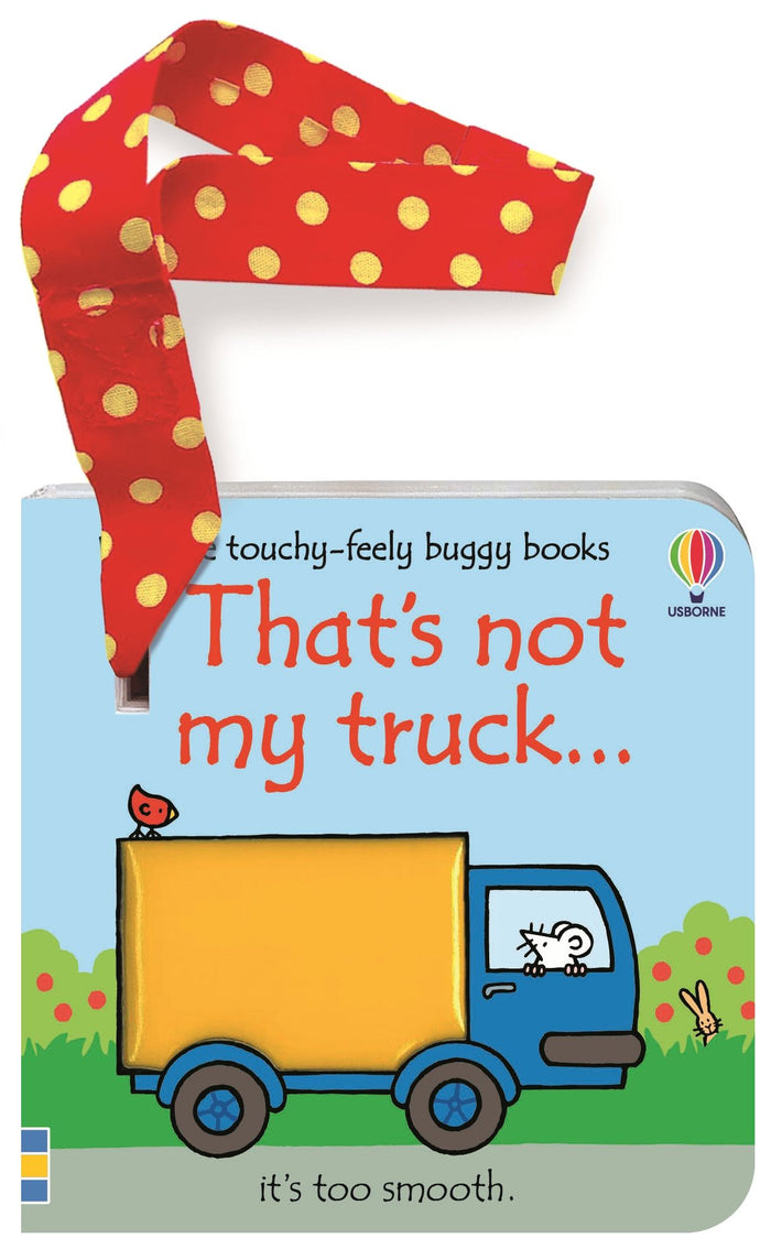 Board book with a blue truck and yellow cargo box illustration, attached to a red and yellow polka dot ribbon strap.