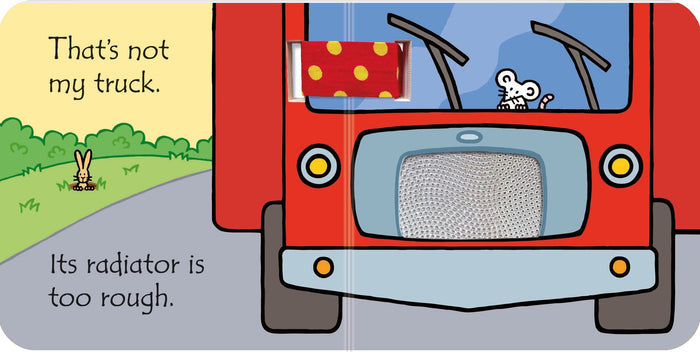 Red truck illustration with a rough textured radiator, white mouse driver, and red and yellow polka dot fabric patch.